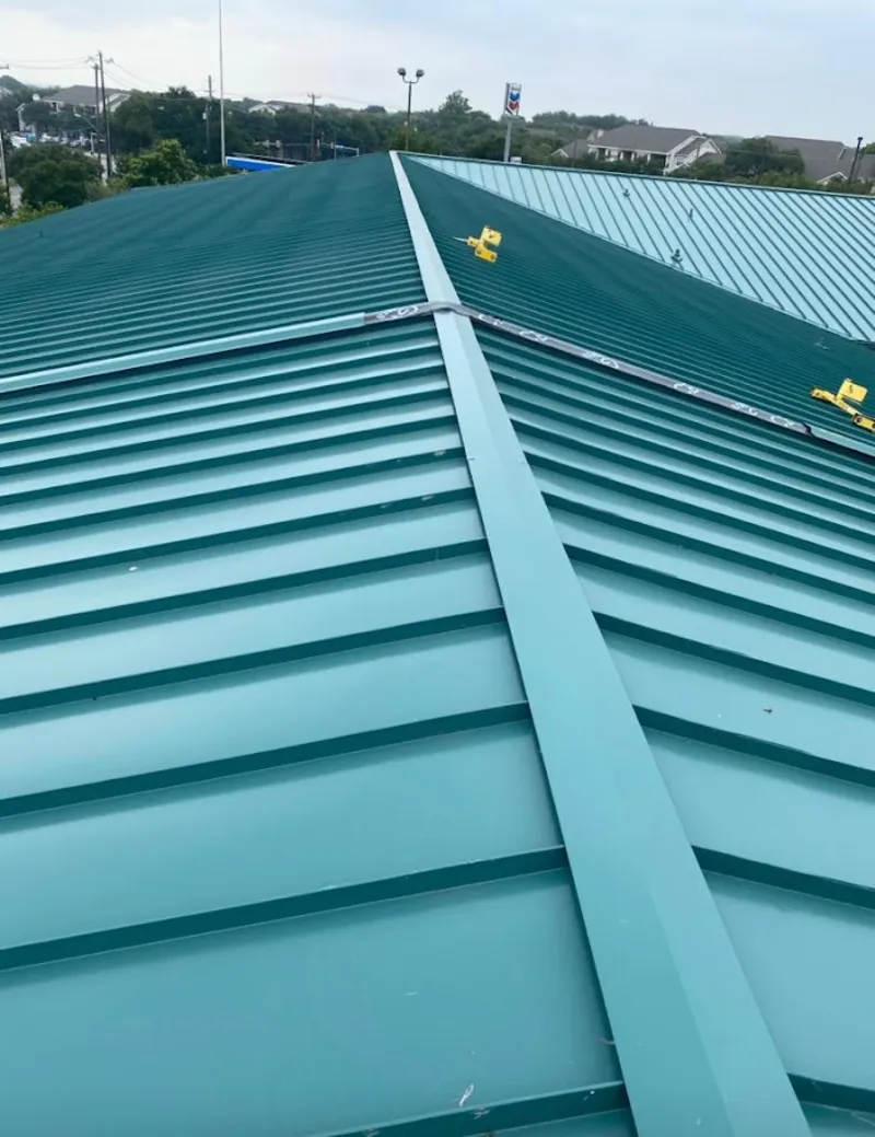 Green commercial metal roof ridge and valley for Metal Roof Repair in Fife